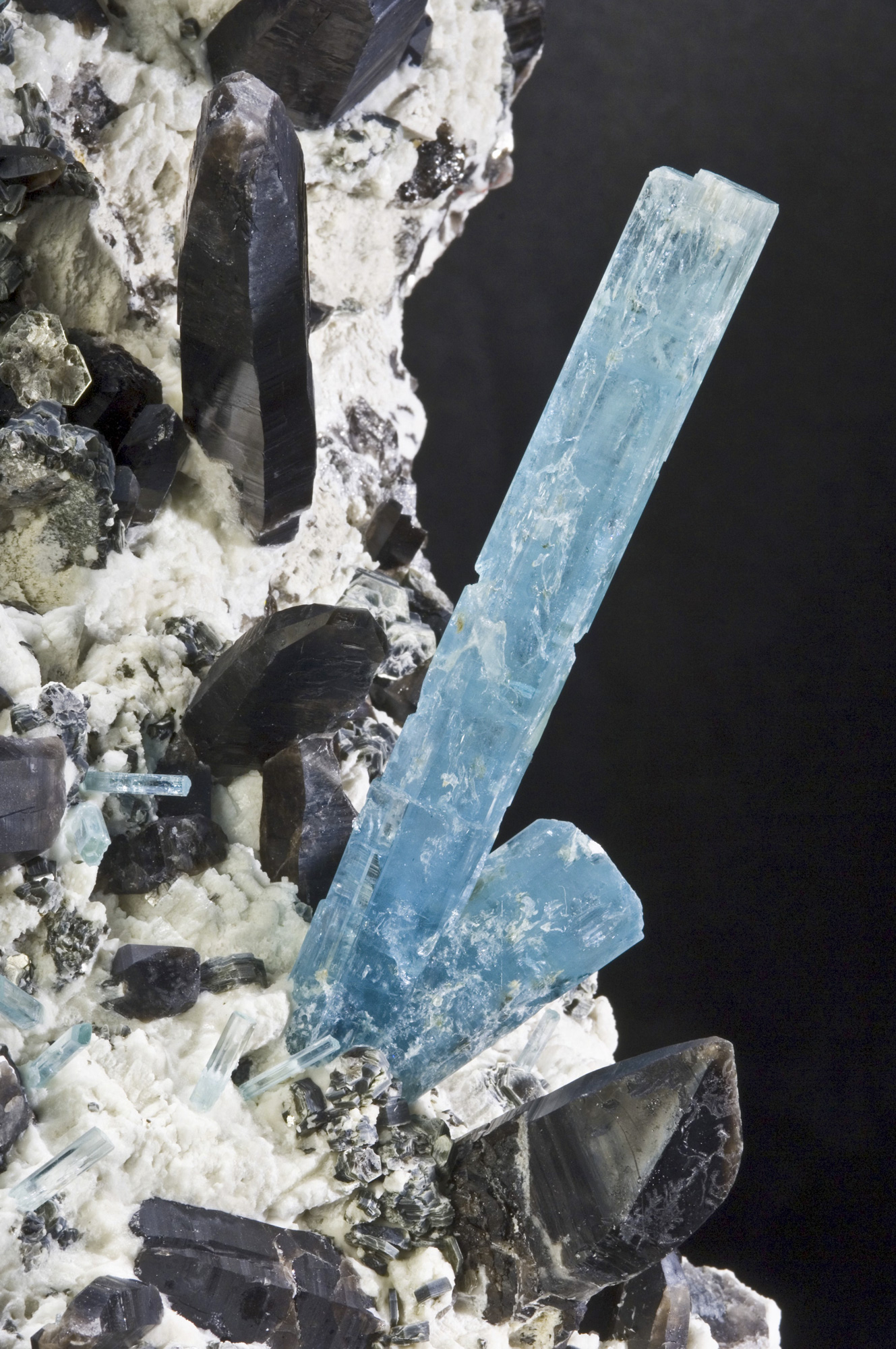 Close view of Diane's Pocket aquamarine crystals with smoky quartz, feldspar, mica, and garnet from Mount Antero